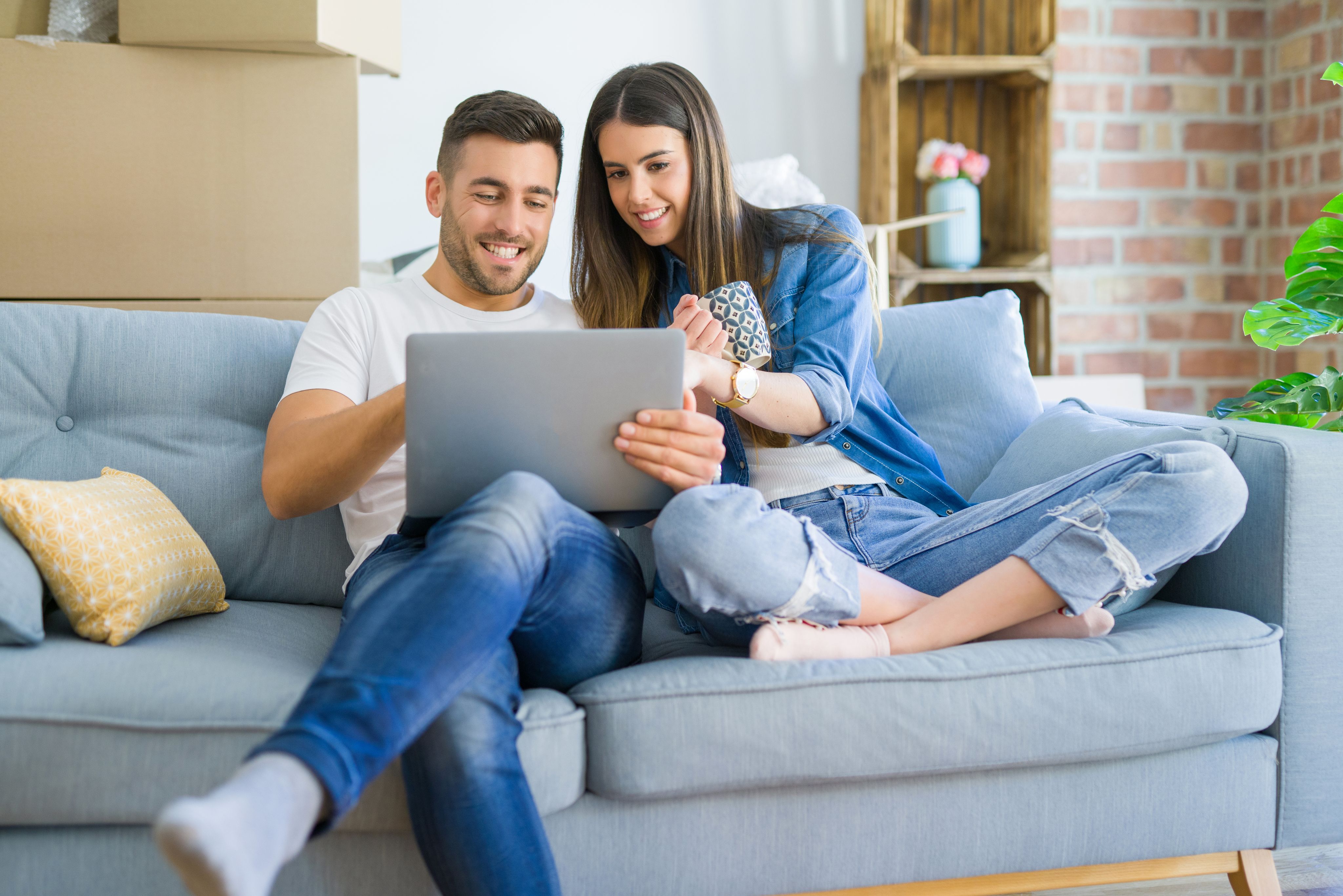 Couple looking at laptop